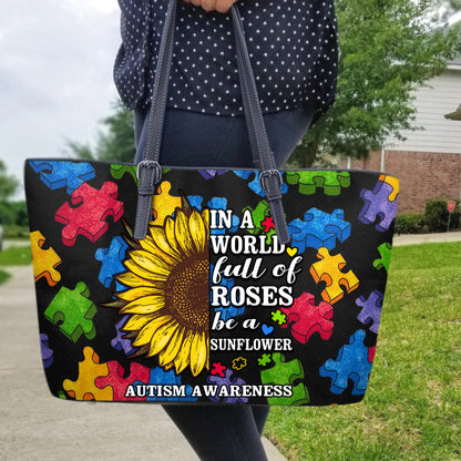 In A World Full Of Roses Be A Sunflower Leather Tote Bag