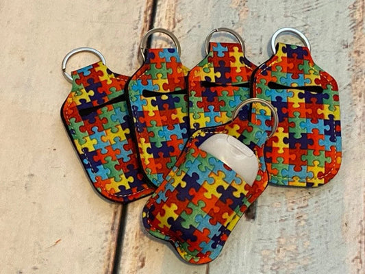 AUTISM Puzzle Print HAND SANITIZER Holder Key Chain Air Pod Case - Quantity One