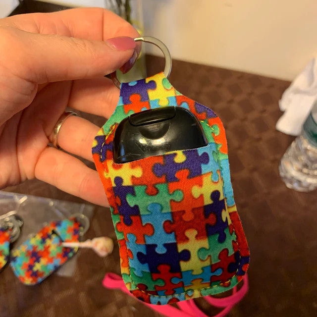 AUTISM Puzzle Print HAND SANITIZER Holder Key Chain Air Pod Case - Quantity One