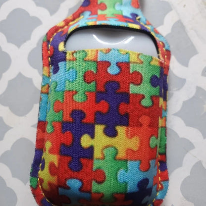 AUTISM Puzzle Print HAND SANITIZER Holder Key Chain Air Pod Case - Quantity One